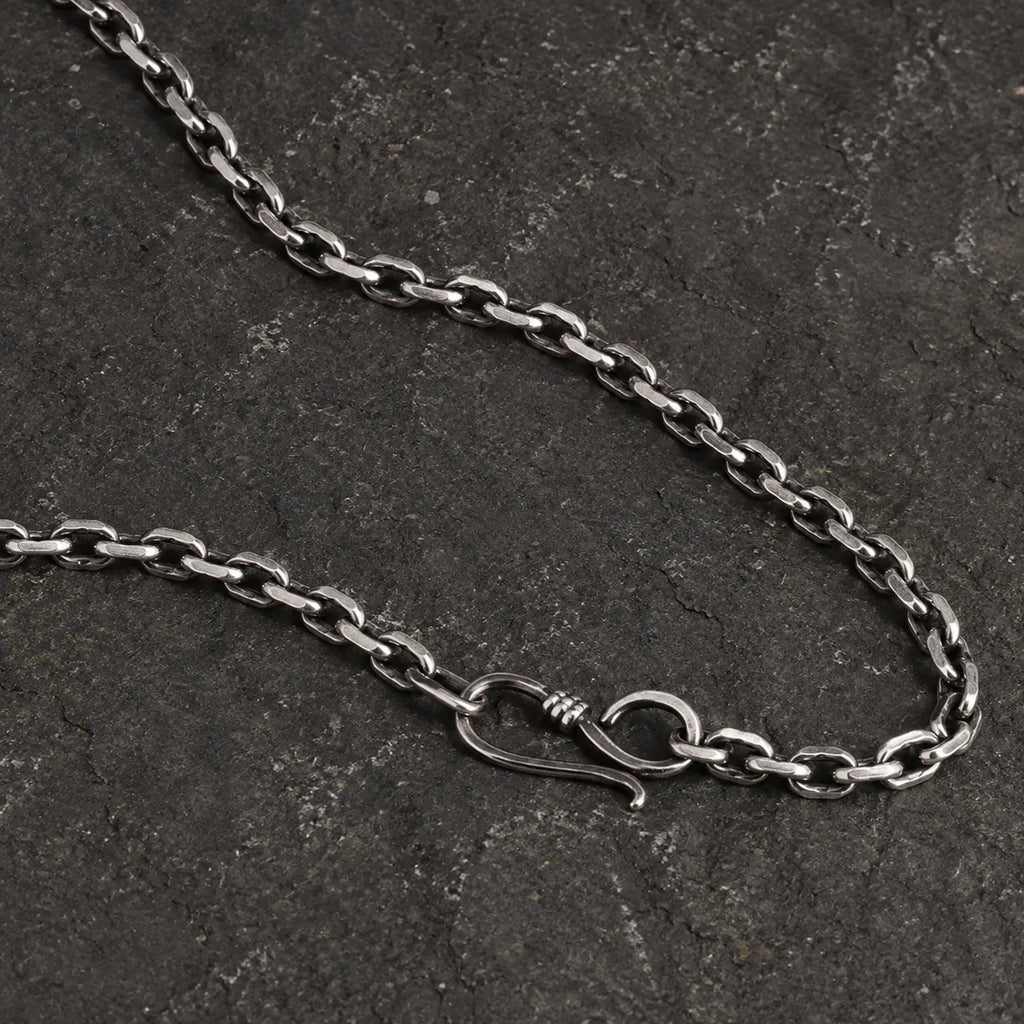 Close-up of the 3.0 mm oxidized sterling silver chain with its S-hook clasp