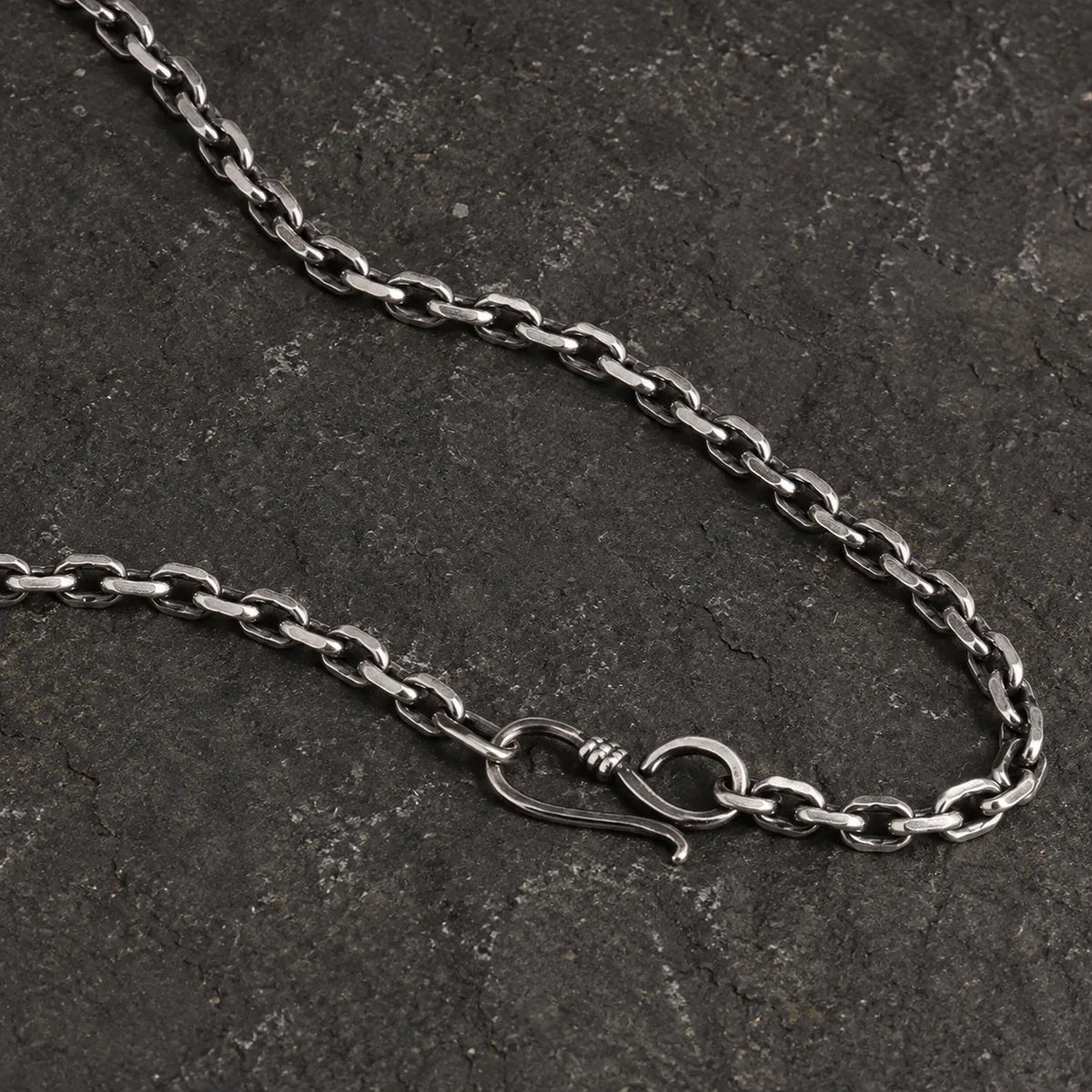 Close-up of the 3.0 mm oxidized sterling silver chain with its S-hook clasp