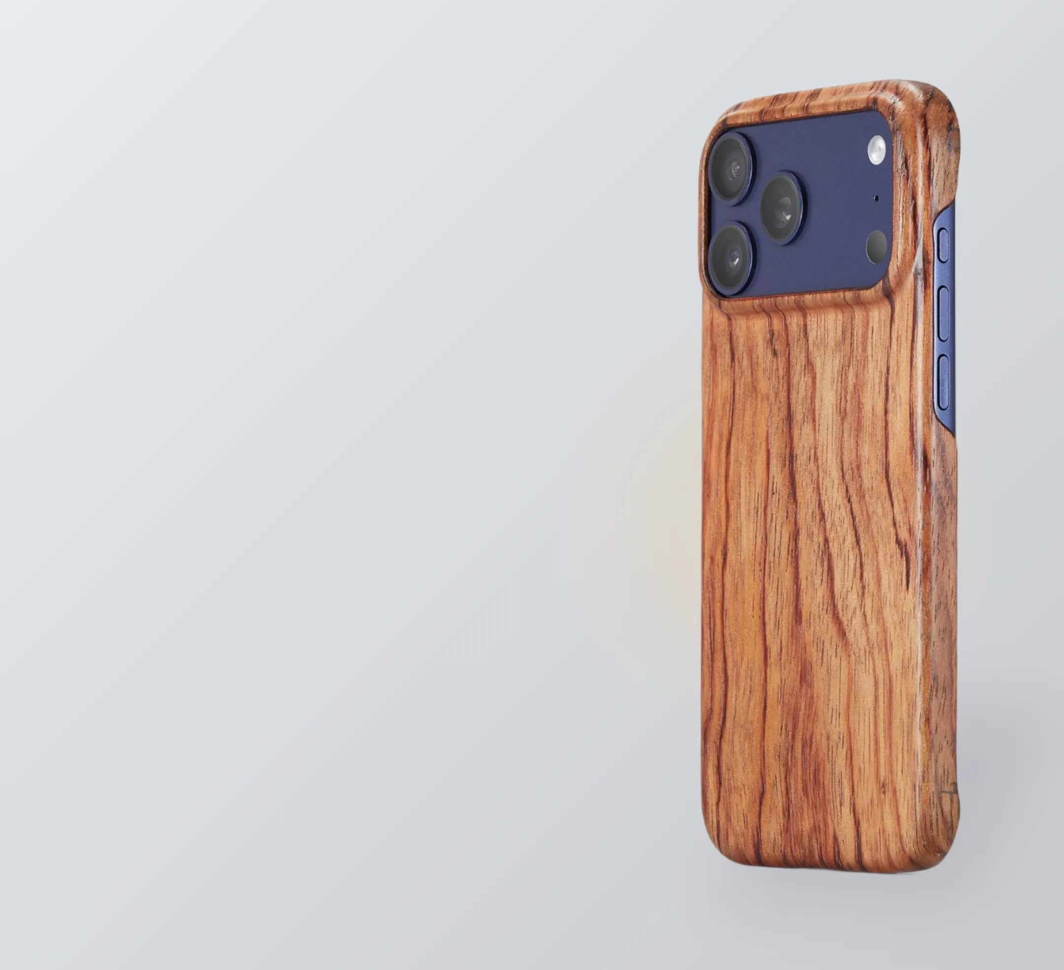 Phone case with wooden design on a light gray background