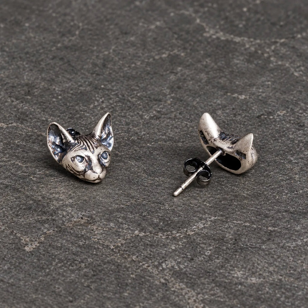 Front and back views of Sphynx cat stud earrings showing the straight post and butterfly back