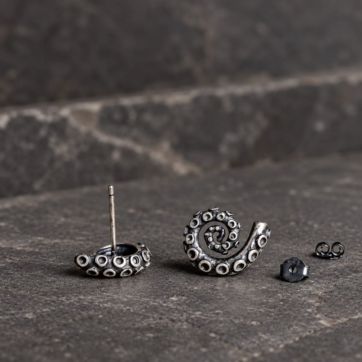 Front and rear views of tentacle stud earrings with straight posts and butterfly backs